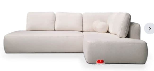 A modern, off-white L-shaped sectional sofa with soft, rounded edges and a low profile. It features… — 3D model