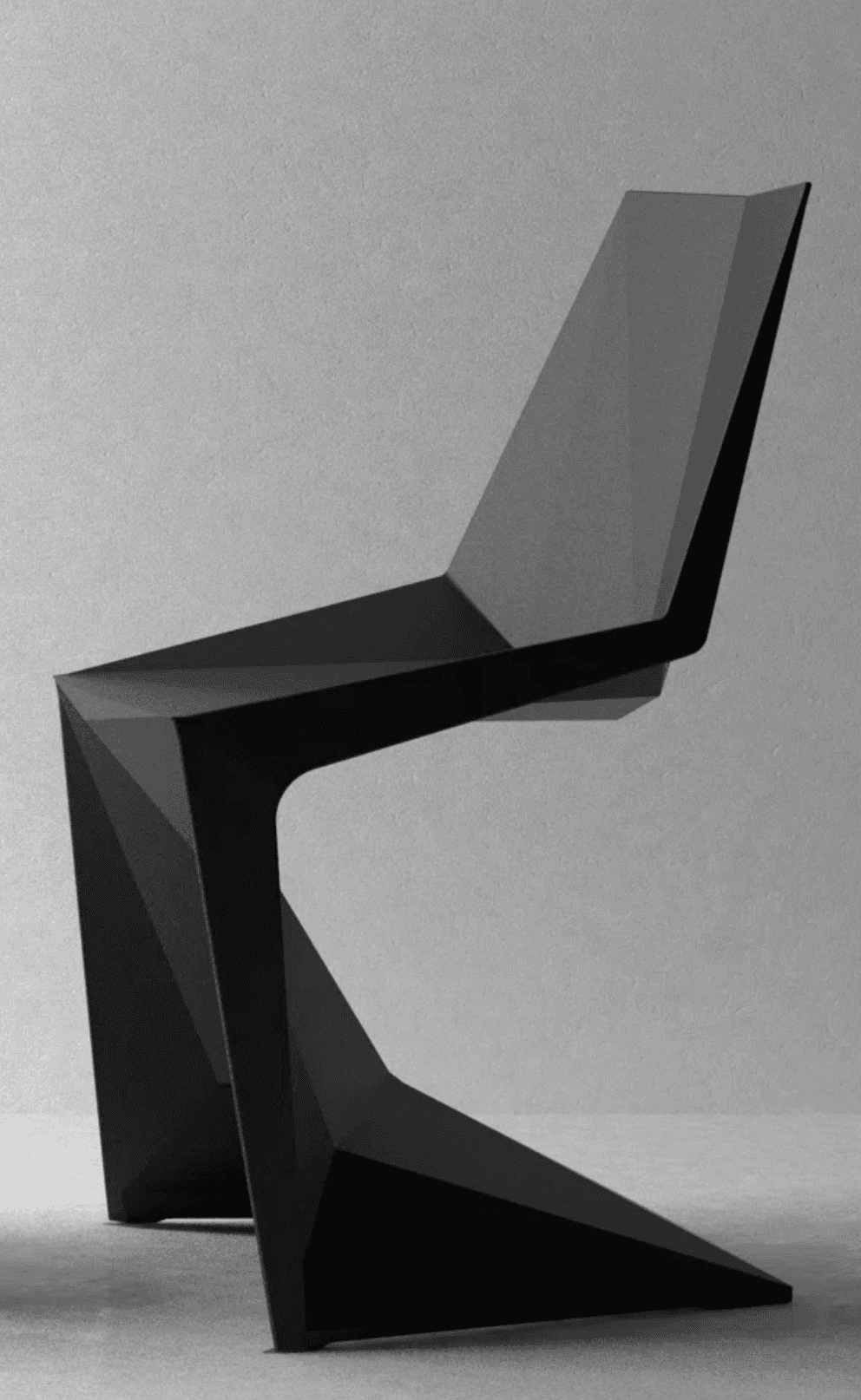 A striking contemporary chair featuring a highly geometric and faceted design, rendered in a matte b… — 3D model