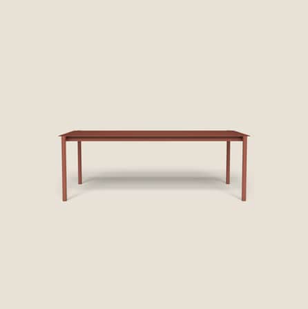 A minimalist rectangular table in a terracotta red color, featuring a flat top and four straight leg… — 3D model
