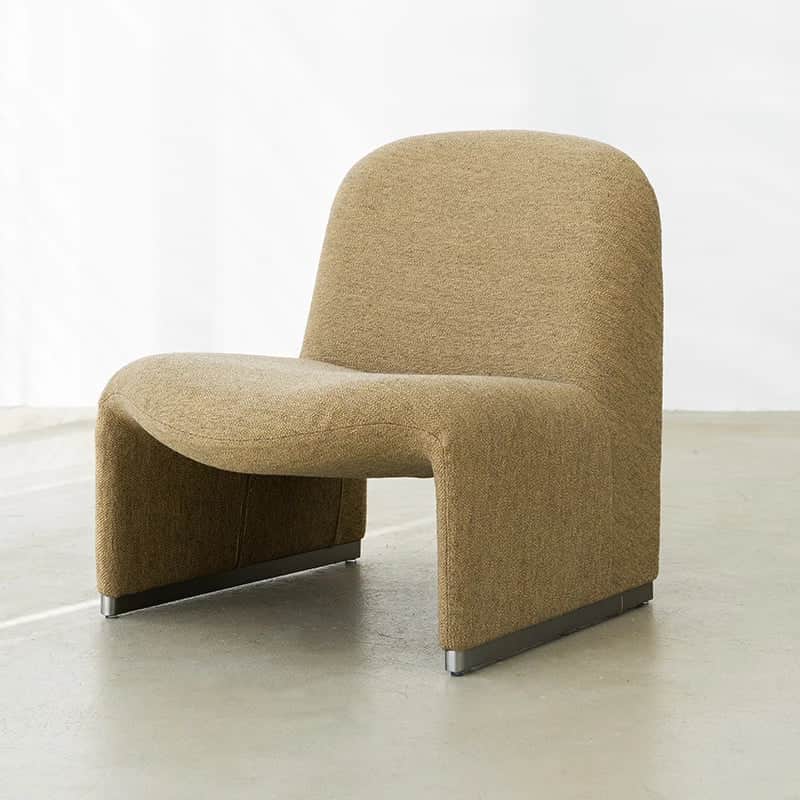 A contemporary lounge chair with a unified, curved form. The chair features a high, rounded back tha… — 3D model