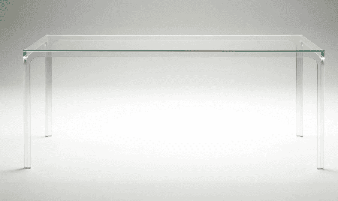 A modern rectangular table constructed entirely from clear, transparent material, likely glass or ac… — 3D model