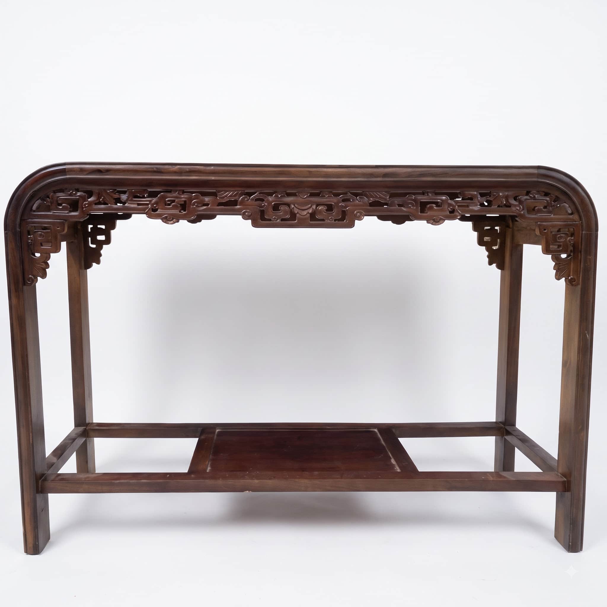 A long, narrow dark brown wooden console table featuring a rectangular top with gently curved ends a… — 3D model