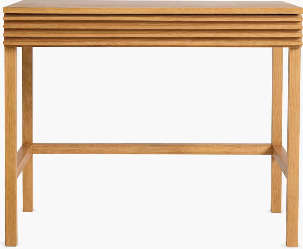 A light-colored oak wood desk featuring a distinct slatted drawer front and a minimalist design. The… — 3D model