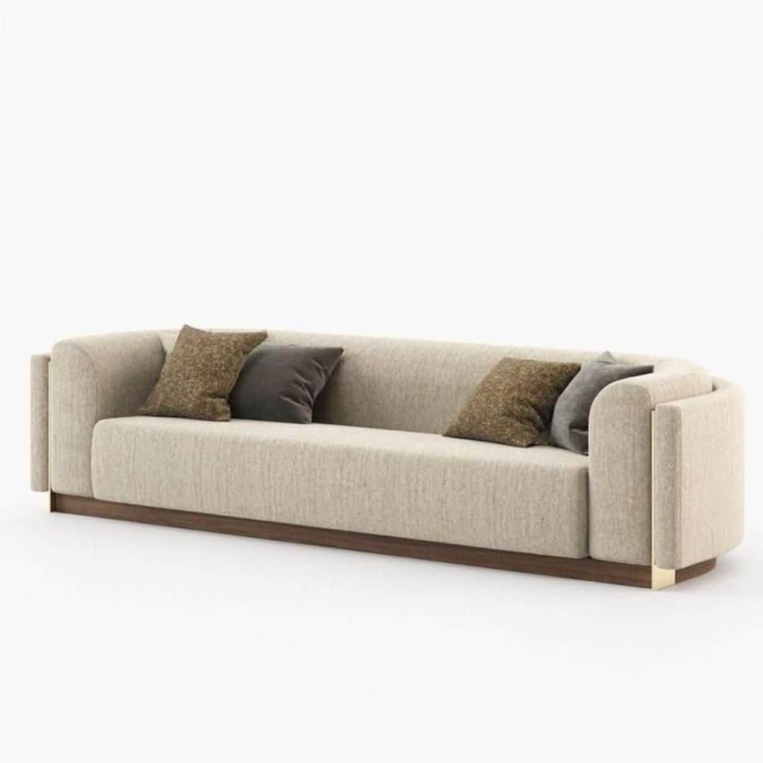 A contemporary three-seater sofa with a continuous back and armrest design, upholstered in a light b… — free GLTF 3D model