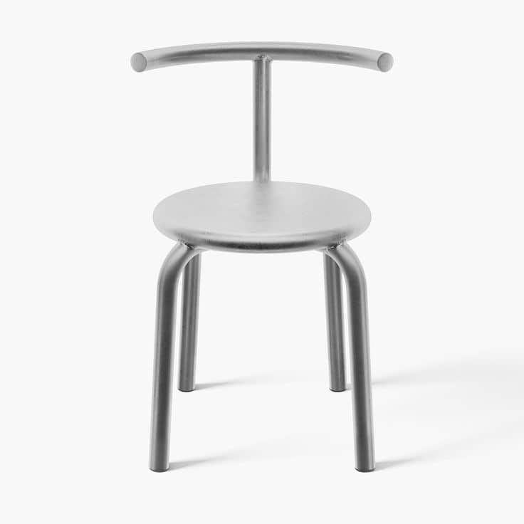 A minimalist gray metallic stool with a round seat and a simple, curved backrest. The frame and legs… — 3D model