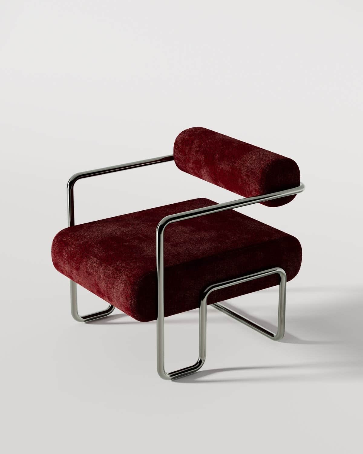 A modernist lounge chair featuring a continuous tubular chrome-plated steel frame and plush burgundy… — free FBX 3D model