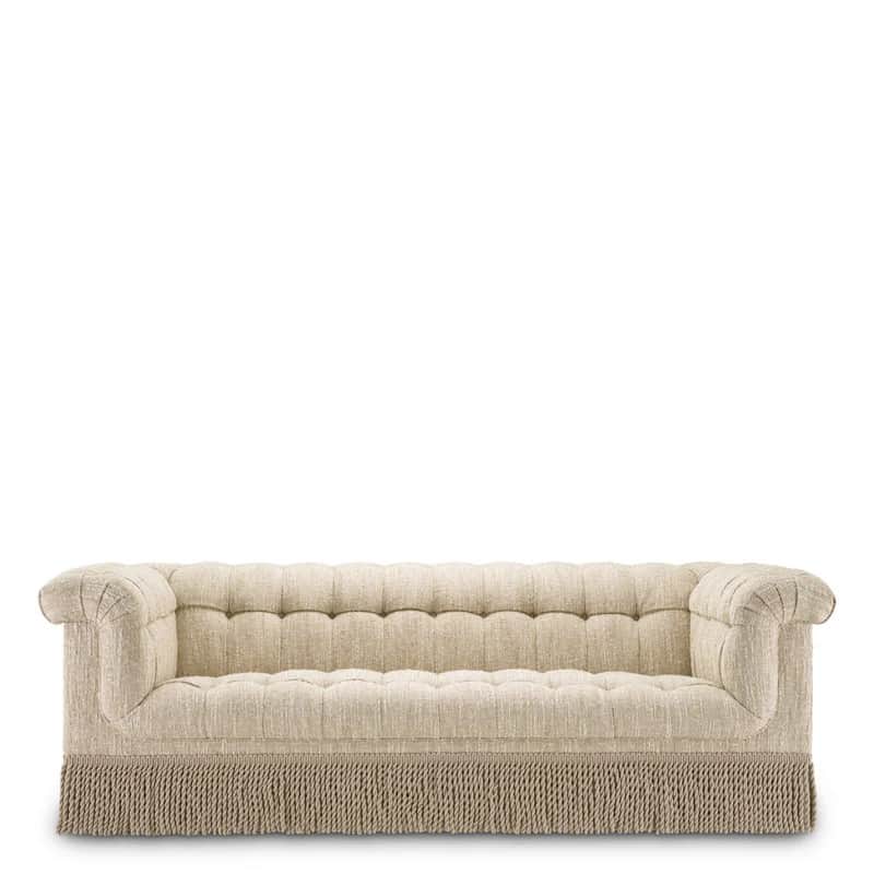 A three-seater sofa with a tufted back and seat, rolled arms, and a decorative fringe along the bott… — 3D model
