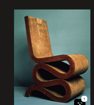 A chair made of bent plywood with a distinctive wavy or serpentine form, finished in natural wood gr… — free STL 3D model