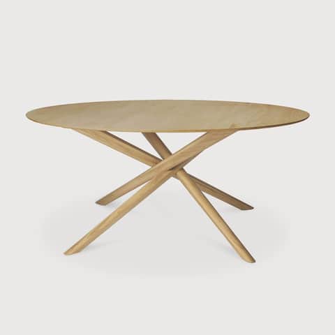 An oval dining table with a light wood finish and a sculptural base composed of intersecting wooden… — 3D model