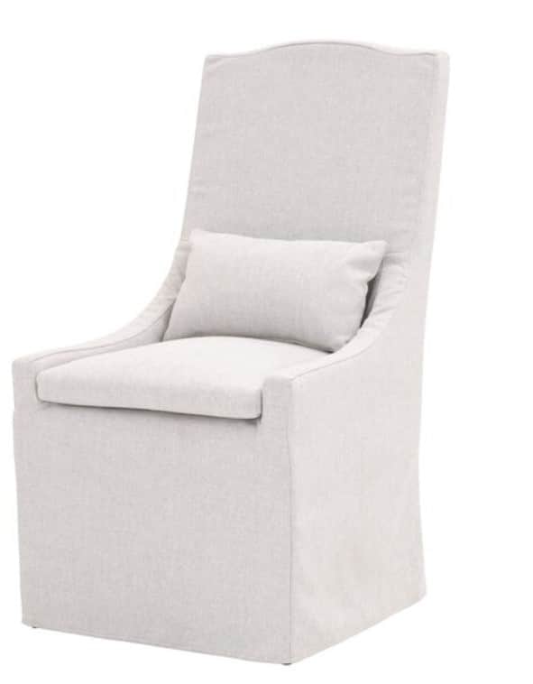 A slipcovered armchair with a high, curved back, a seat cushion, and a lumbar pillow. The chair is u… — 3D model