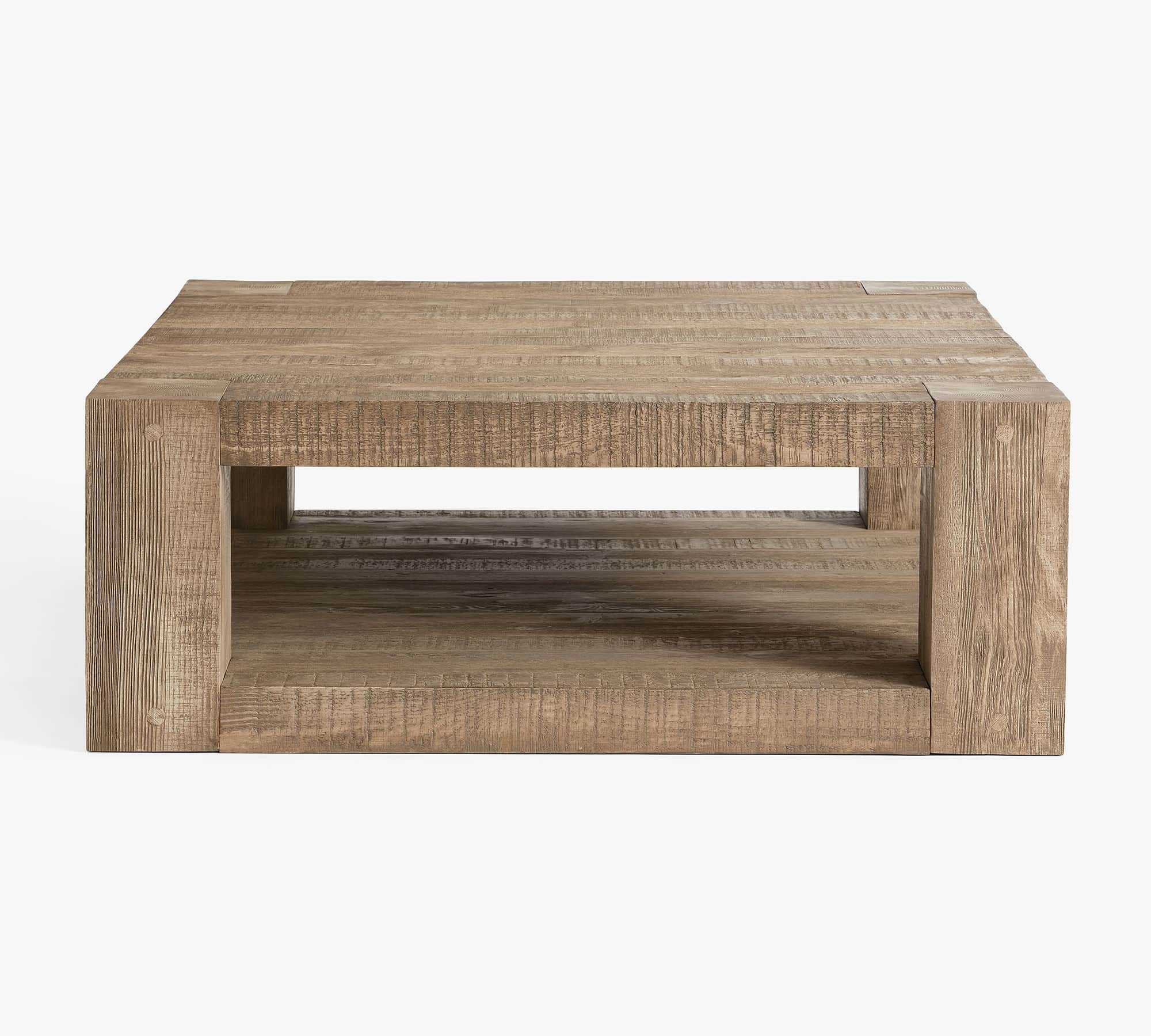A square, block-style coffee table constructed from thick, distressed reclaimed wood, featuring a so… — 3D model