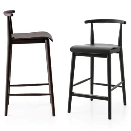 A contemporary bar stool featuring a dark stained wooden construction, including a round seat, four… — 3D model