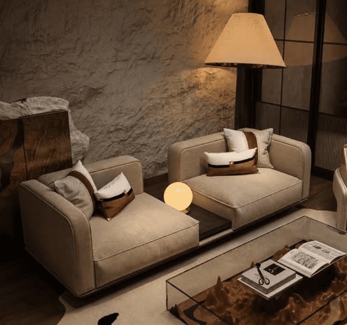 A modern modular sectional sofa featuring two upholstered seating units separated by a dark wood int… — 3D model