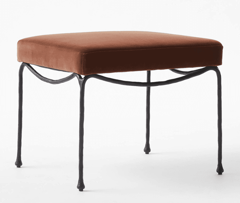 A square, velvet-upholstered stool with a unique forged iron base and legs. — 3D model