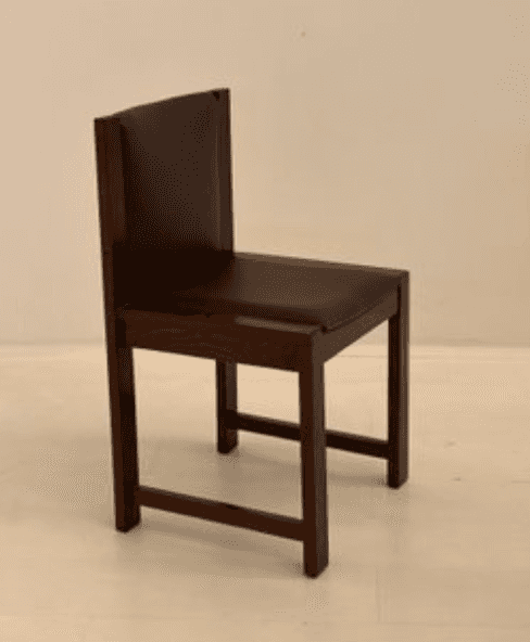 A wooden chair with upholstered seat and backrest. The chair features a rectangular seat and a tall,… — free FBX 3D model