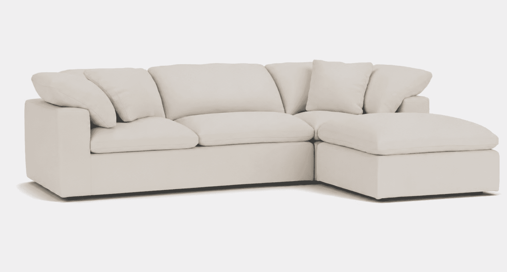 A light-colored, contemporary modular sectional sofa featuring plush, oversized cushions and an inte… — free OBJ 3D model