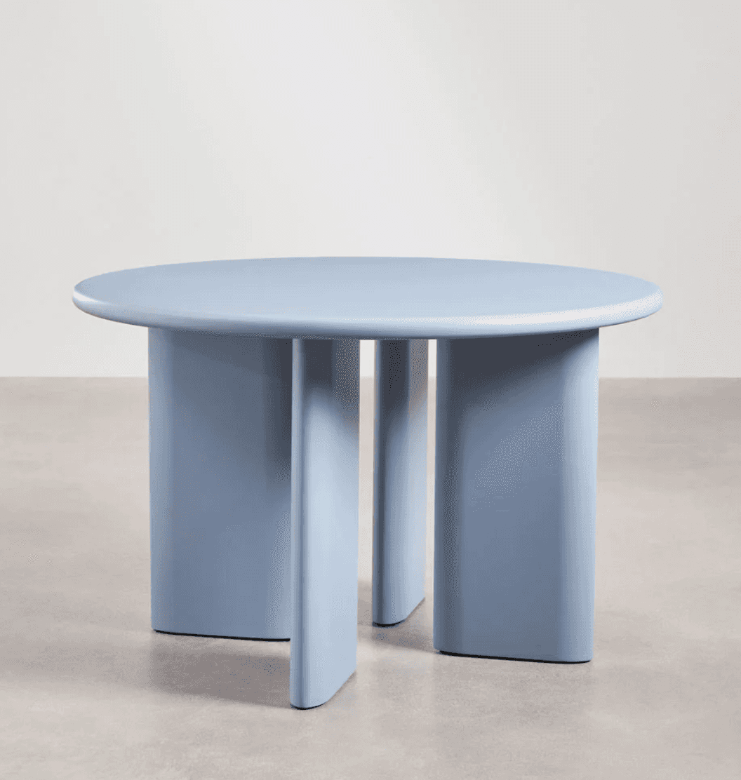 A contemporary round coffee table featuring a light blue, monochromatic finish and a distinctive bas… — 3D model