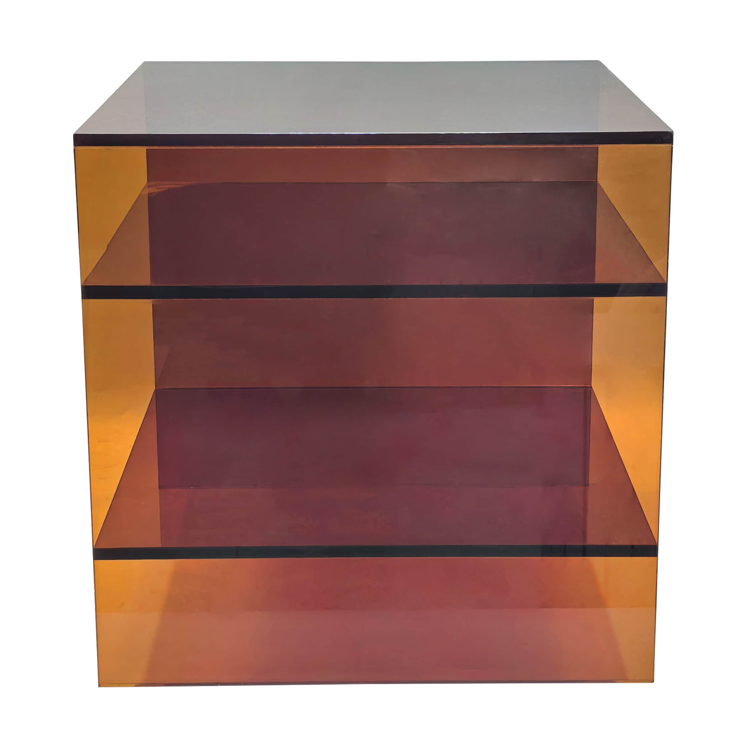 A square, cube-shaped open shelving unit constructed from translucent acrylic. It features a three-t… — 3D model