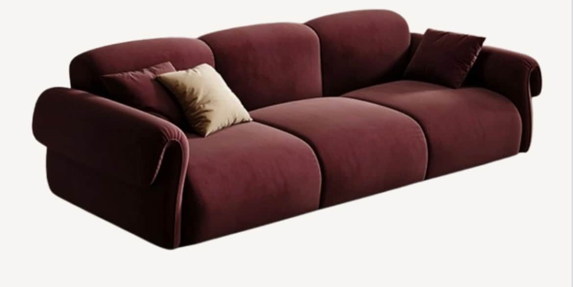 A contemporary three-seater sofa featuring a distinctive curved, segmented design, upholstered in a… — 3D model