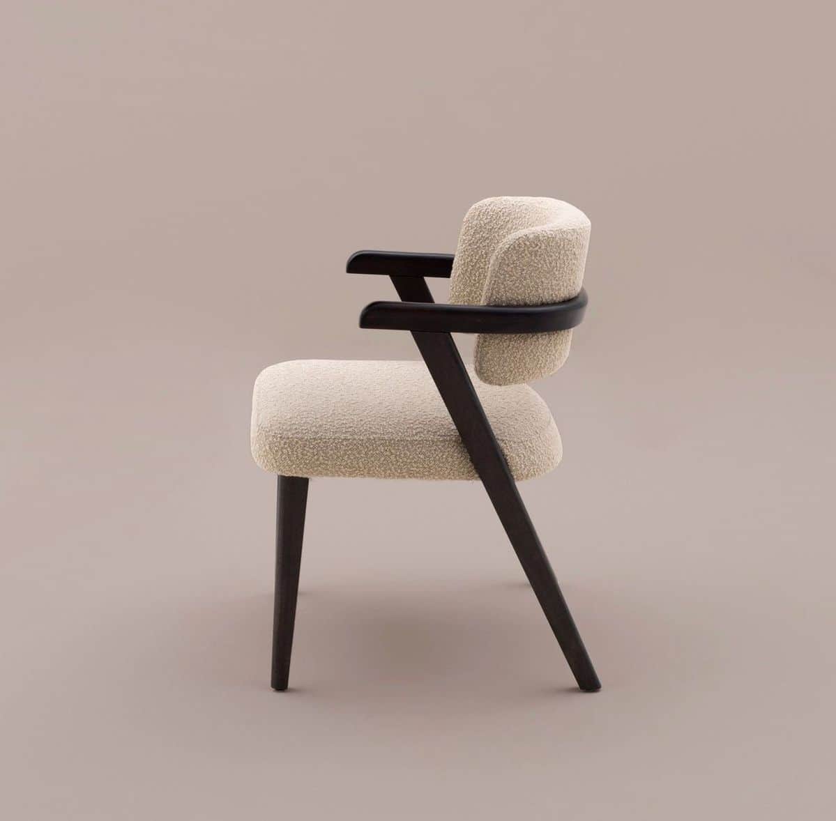 A contemporary armchair featuring a light, textured boucle upholstery on the seat and curved backres… — 3D model