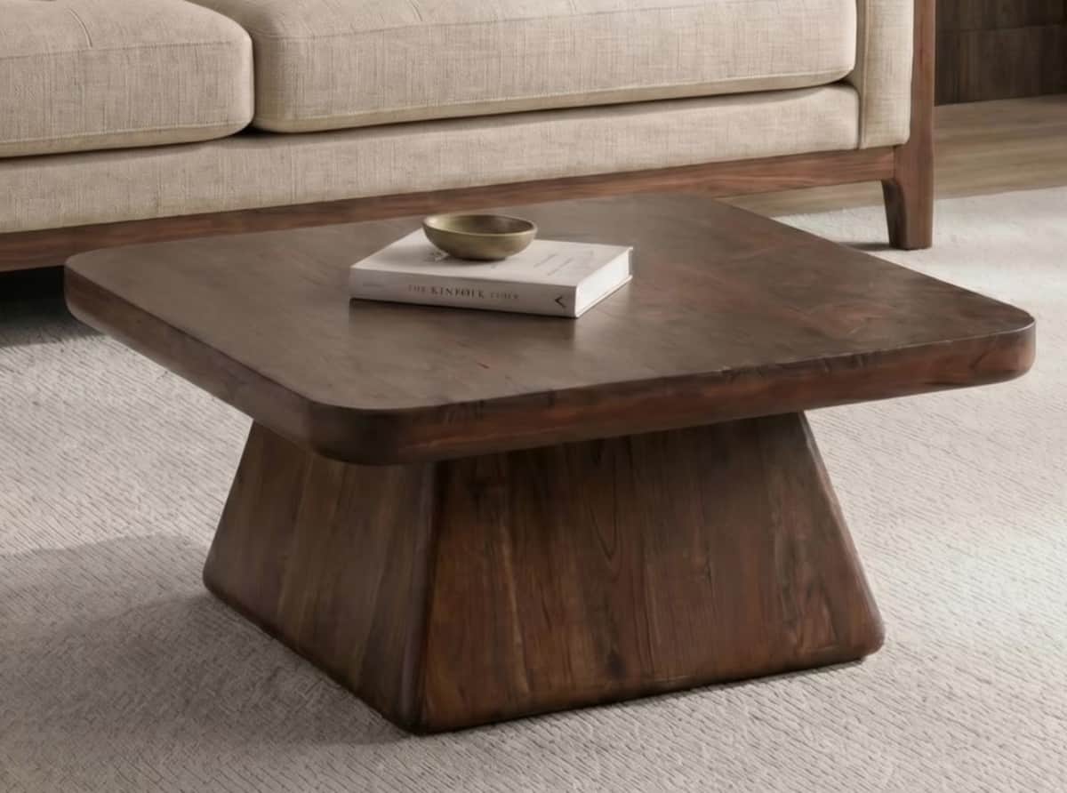 A square-shaped coffee table made of dark wood, featuring a thick tabletop with rounded corners and… — 3D model