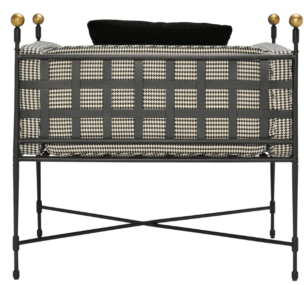 A bench with a dark metal frame and a cushioned seat upholstered in a black and white houndstooth pa… — 3D model