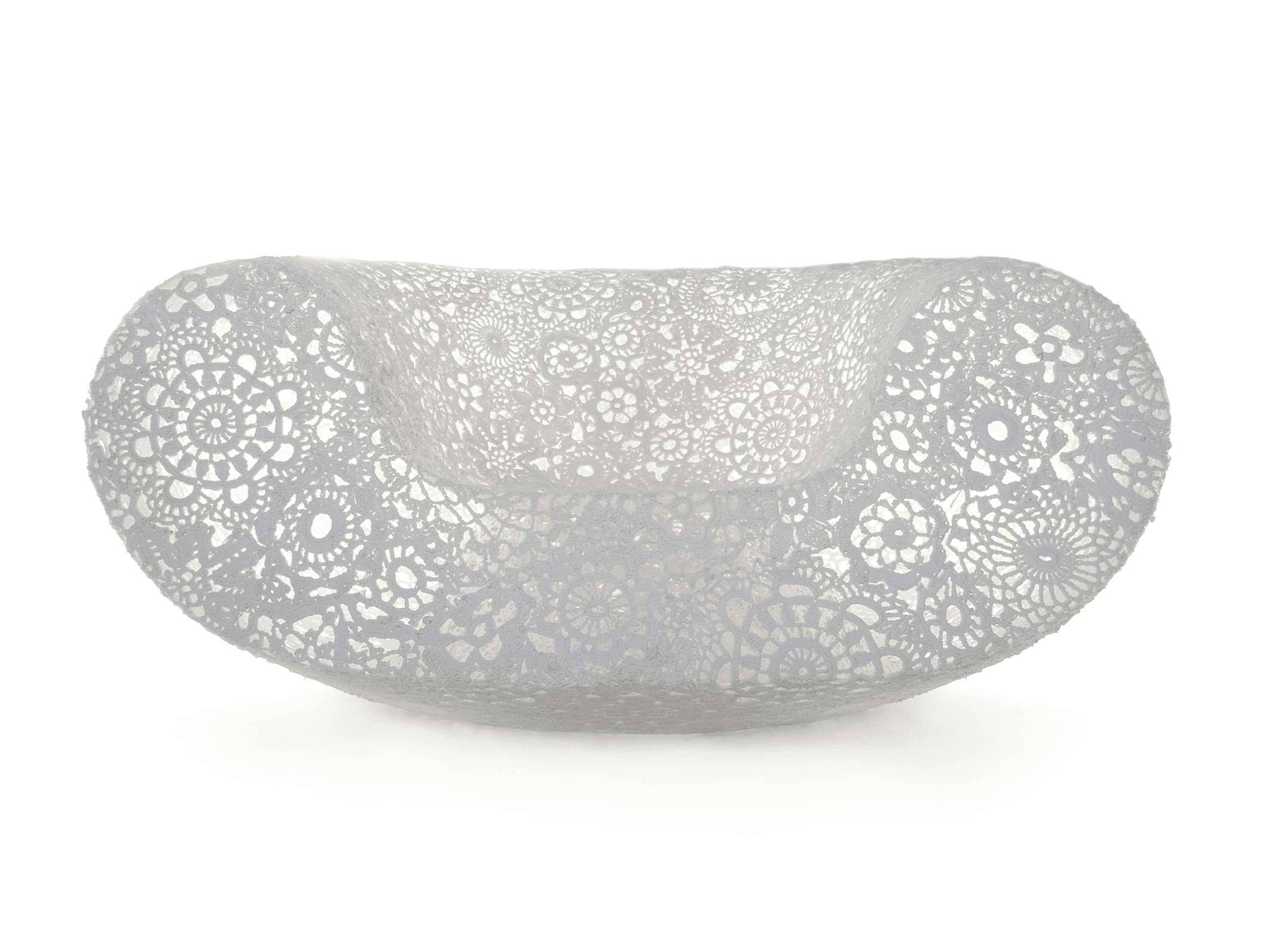 A modern, sculptural chaise lounge featuring an intricate, openwork crochet or lace-like pattern acr… — 3D model