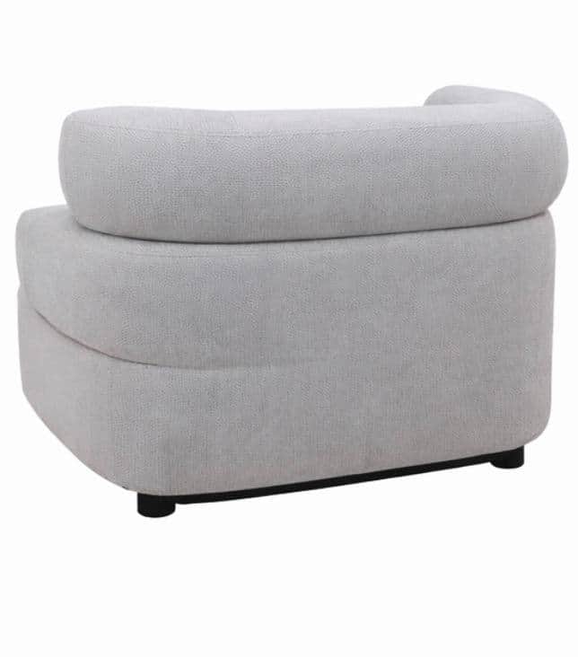 A contemporary armchair with a rounded, enveloping design. The chair features a thick, upholstered s… — free OBJ 3D model