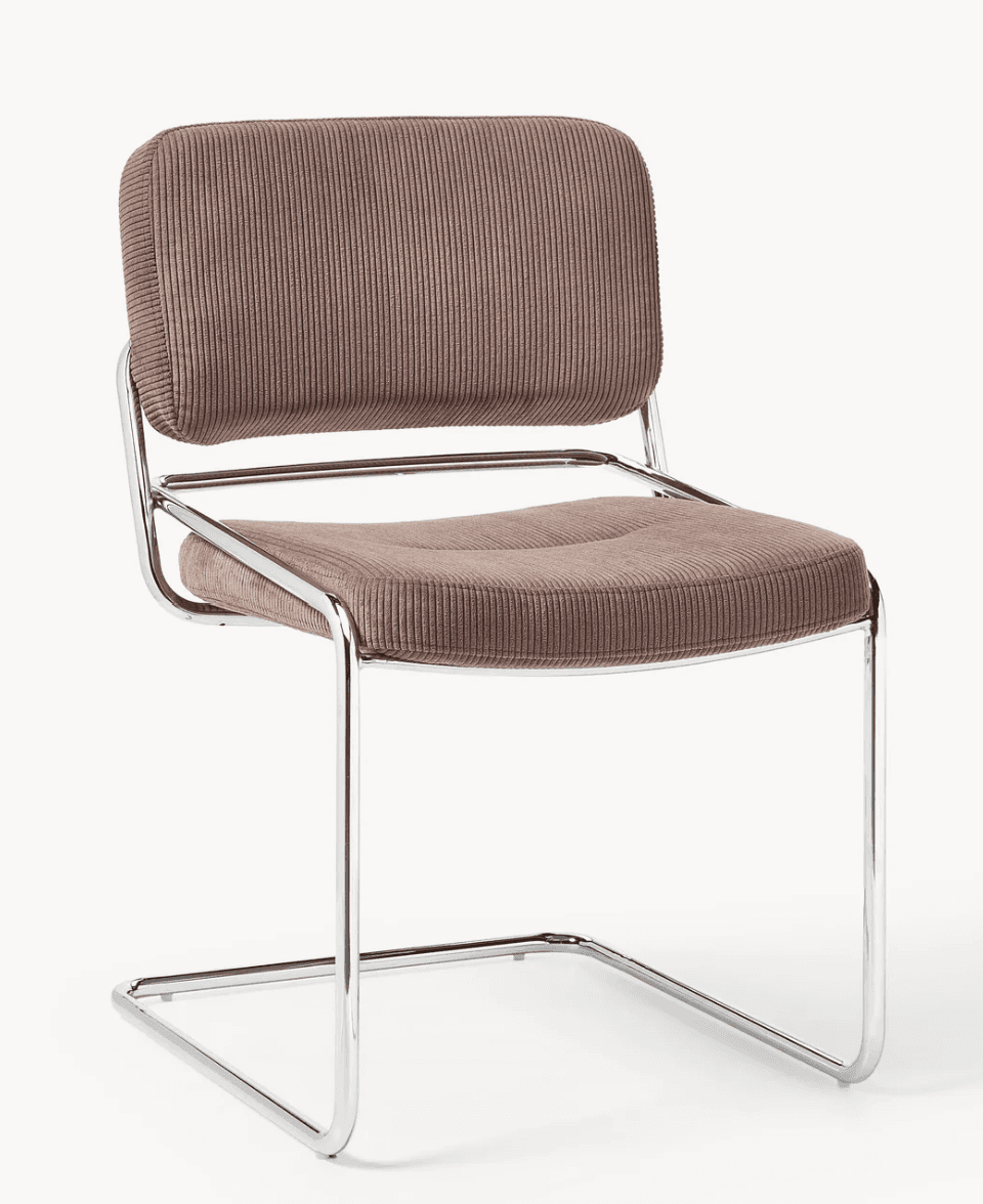 A modern cantilever side chair featuring a continuous polished chrome tubular steel frame and uphols… — 3D model