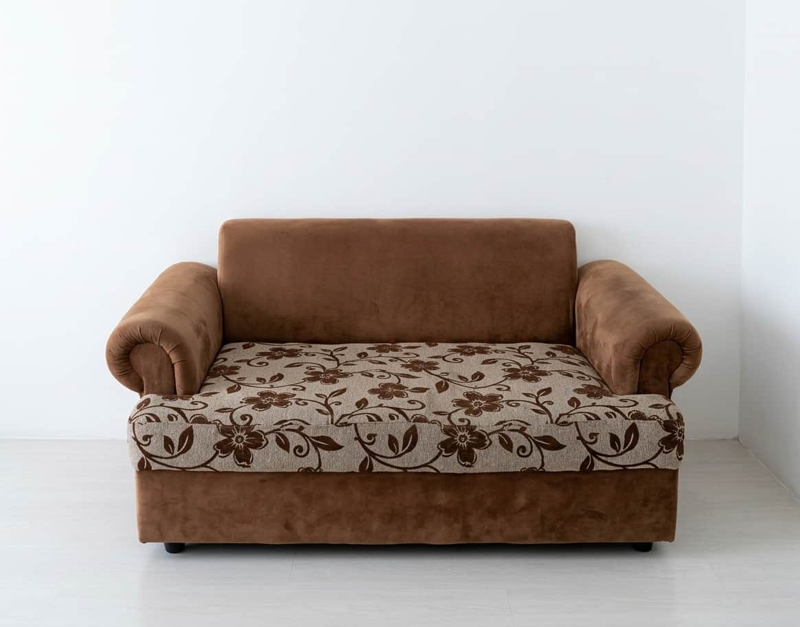 A compact two-seater loveseat featuring rolled armrests and a high backrest. The frame and armrests… — 3D model