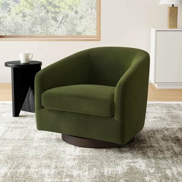 A contemporary armchair with a rounded silhouette and upholstered in a textured fabric. It features… — free OBJ 3D model