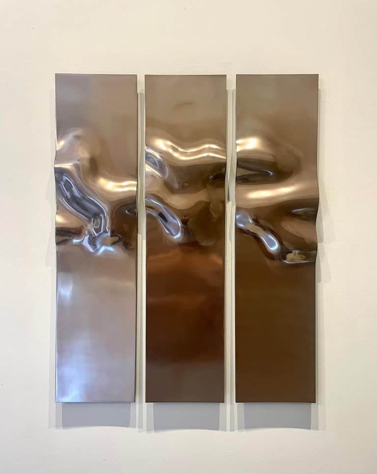 A decorative wall panel consisting of three vertically oriented, undulating surfaces framed within a… — 3D model