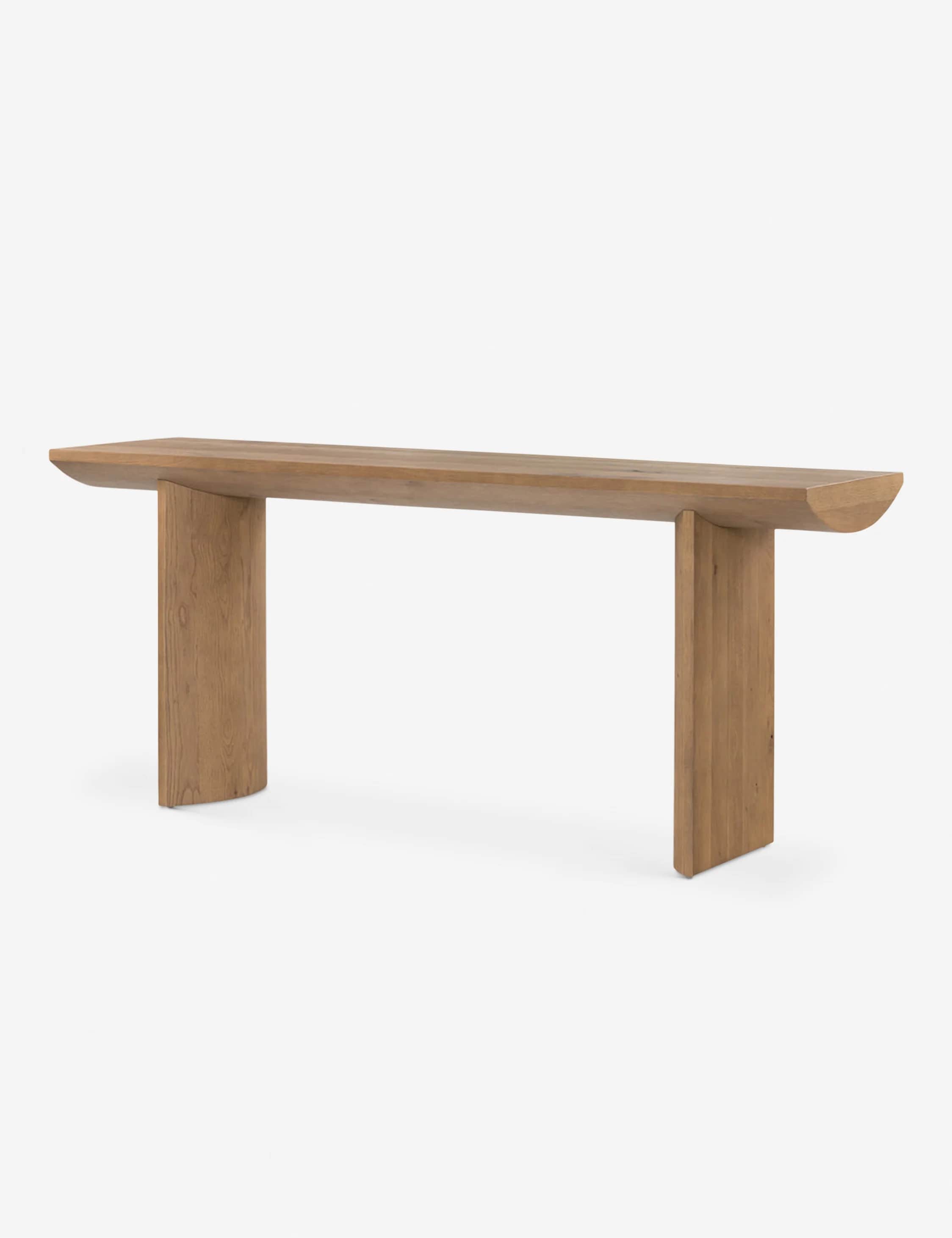 A long, narrow console table with a solid wood top and two block-like legs. The top has a gently cur… — 3D model