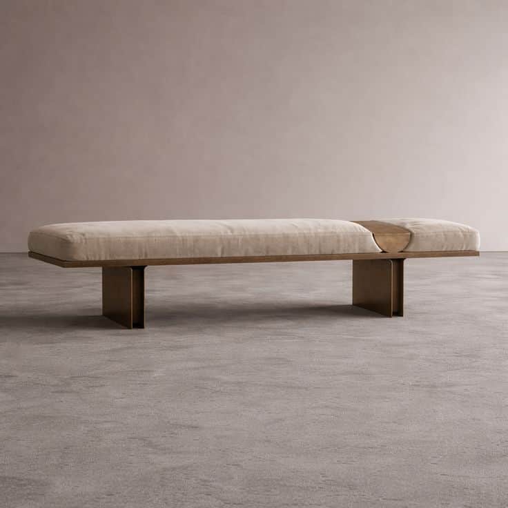 A modern bench with a plush, upholstered seat and a metallic base. The bench features a continuous,… — 3D model