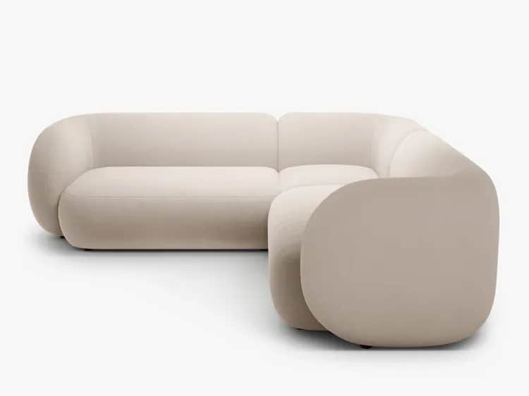 A modern sectional sofa with rounded, organic forms and a low profile. The sofa features deep, plush… — 3D model