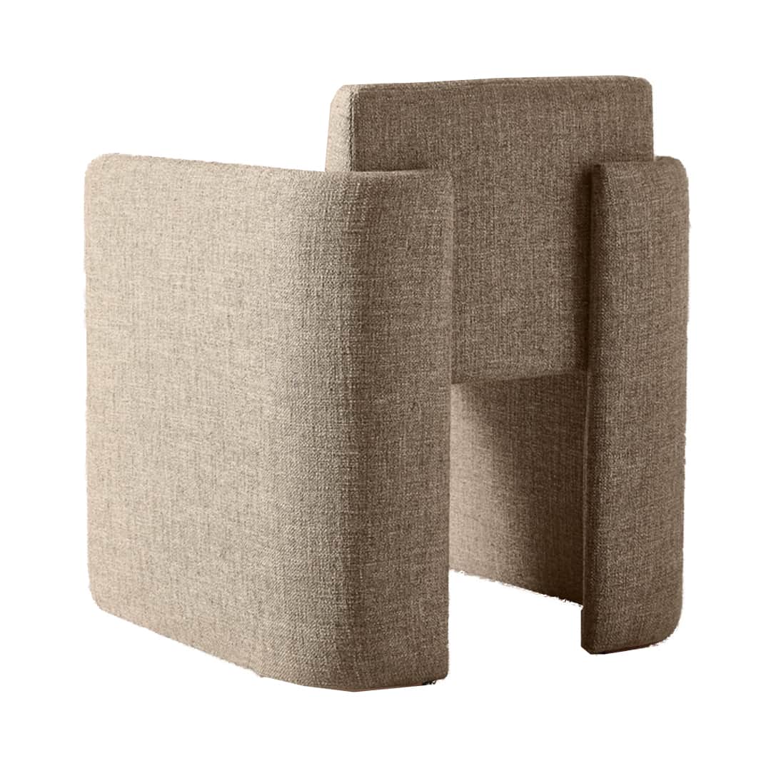 A contemporary armchair with a unique, geometric silhouette. The piece features a modular appearance… — 3D model
