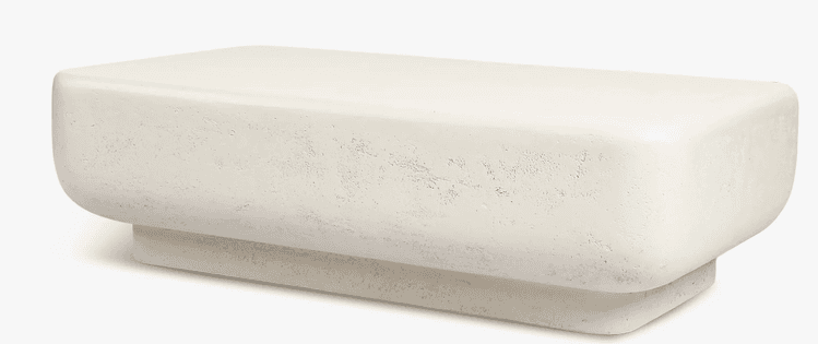 A contemporary rectangular coffee table crafted from a light-colored, textured stone-like material,… — free SKP 3D model