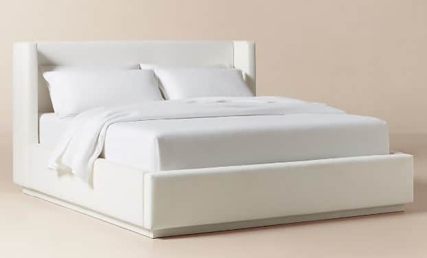 A contemporary upholstered platform bed featuring a clean, minimalist design. The headboard has subt… — 3D model