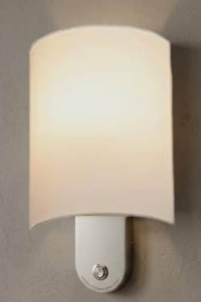 A modern, rectangular plug-in night light featuring a curved, frosted white diffuser attached to a b… — 3D model