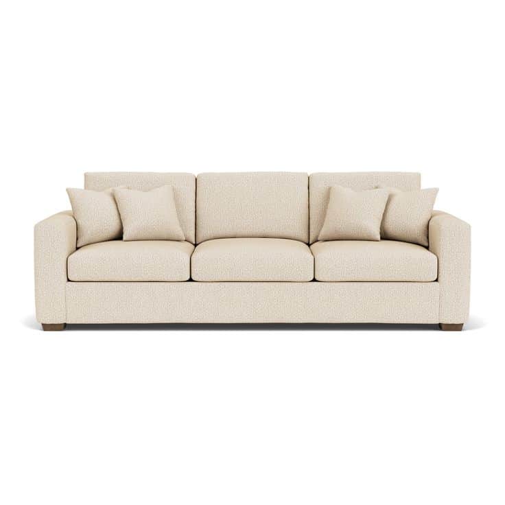 A modern three-seater sofa upholstered in a light, textured fabric, featuring square arms, loose sea… — 3D model