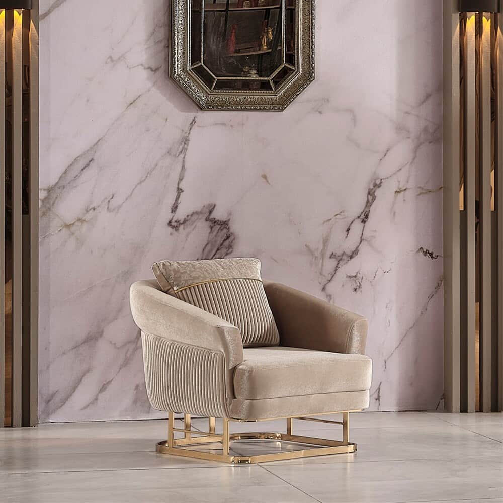 A contemporary armchair featuring soft, light brown velvet upholstery with a distinctive fluted or r… — 3D model