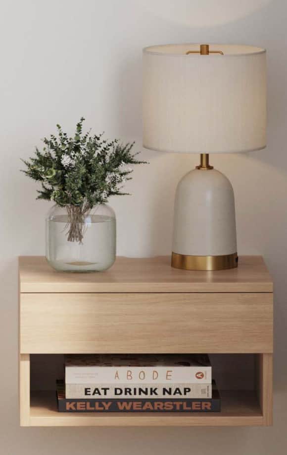 A floating, wall-mounted nightstand constructed from light-toned wood, featuring a clean, minimalist… — 3D model