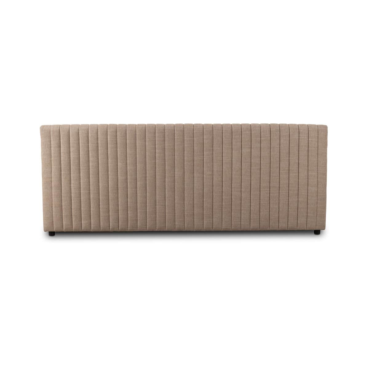 A rectangular upholstered headboard with vertical channel tufting. The headboard has a flat top edge… — 3D model