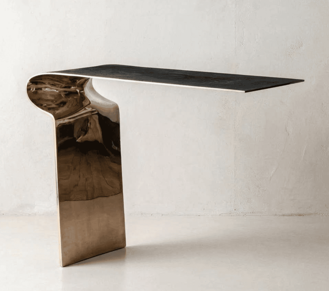 A sleek, modern cantilevered console table featuring a dark rectangular top and a single, curved, te… — 3D model