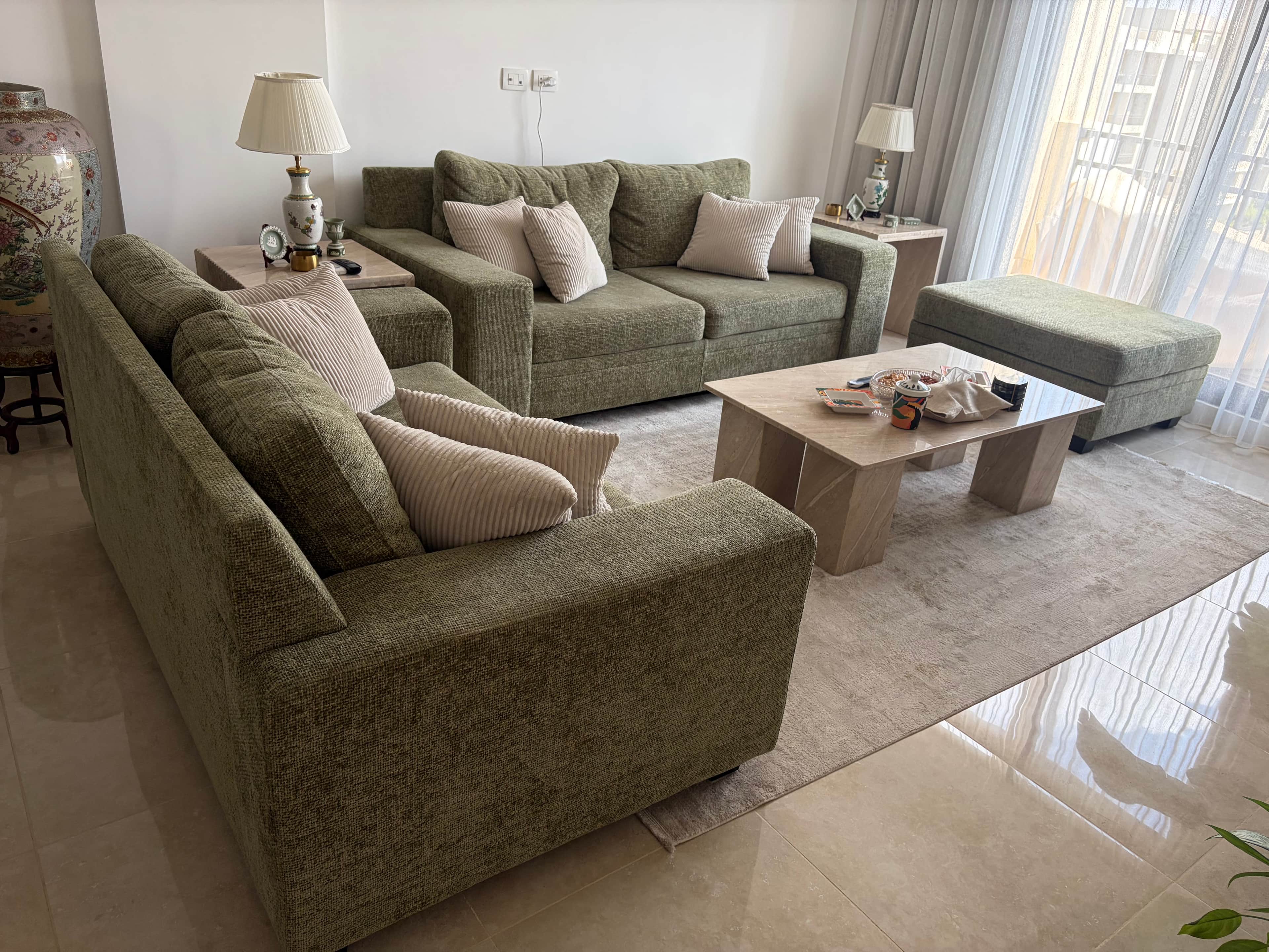 A modern two-seater loveseat upholstered in a textured olive-green fabric. It features clean, straig… — free STL 3D model