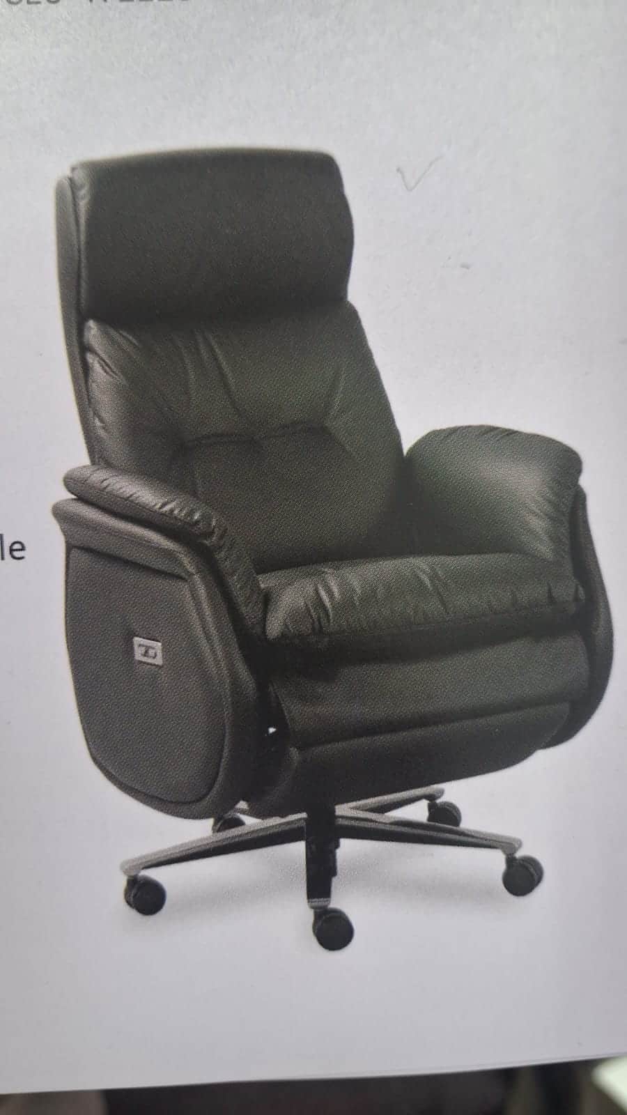 A contemporary dark gray power recliner chair featuring plush, segmented cushioning upholstered in w… — 3D model