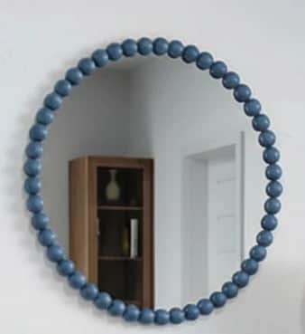 A round wall mirror featuring a unique frame composed entirely of uniformly sized, matte blue spheri… — 3D model