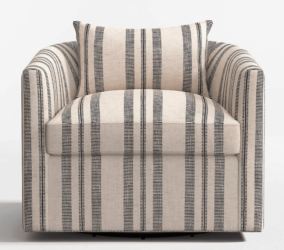 A contemporary upholstered barrel armchair featuring a cream-colored fabric with vertical black stri… — 3D model