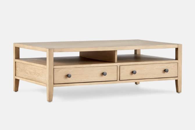 A light-colored wooden coffee table with a rectangular top and an open lower shelf. It features thre… — free OBJ 3D model