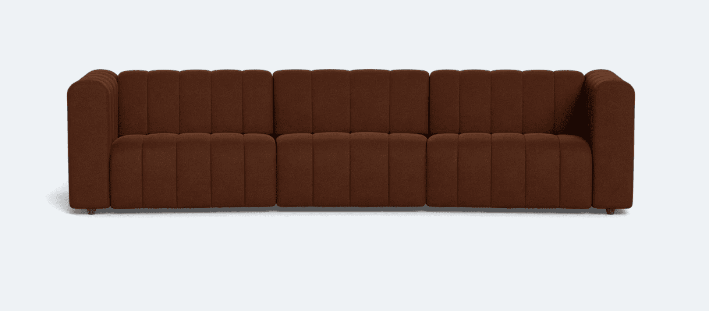 A three-seater sofa upholstered in a textured brown fabric. The sofa features a channel-tufted desig… — 3D model